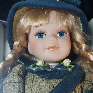 Porcelain Doll with Green Dress and Hat